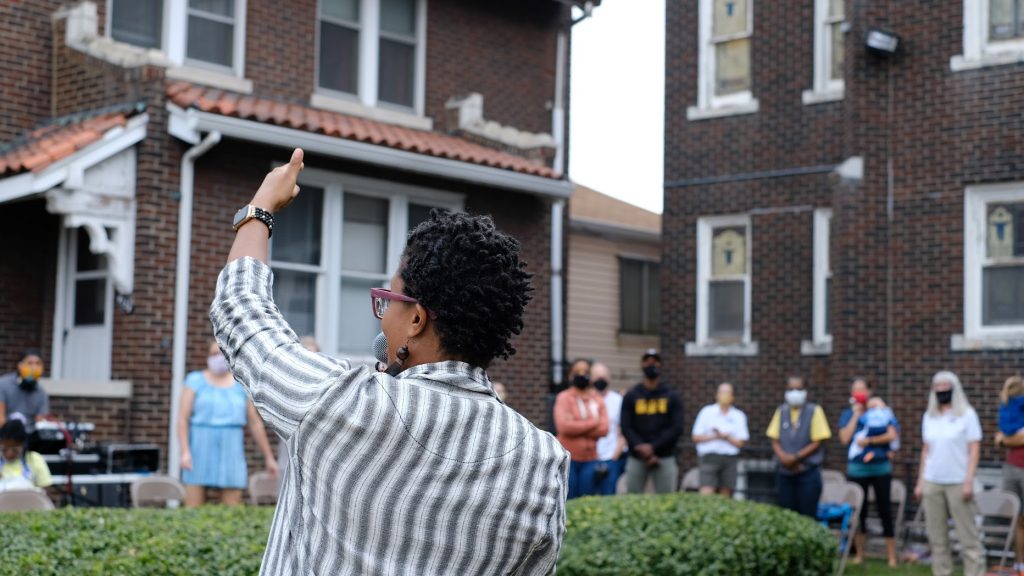 Rev. Michelle Higgins speaks to canvassers